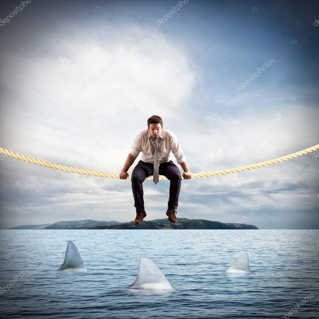 Man sitting on a rope