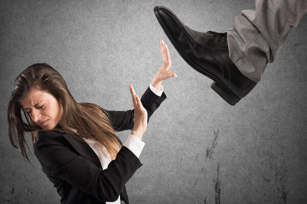 Aggressive boss against his scared employee.