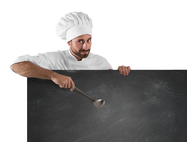 Chef with ladle and board — Stock Photo, Image