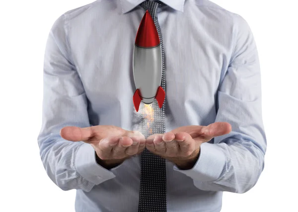 Бизнесмен держит маленькую ракету . — стоковое фото