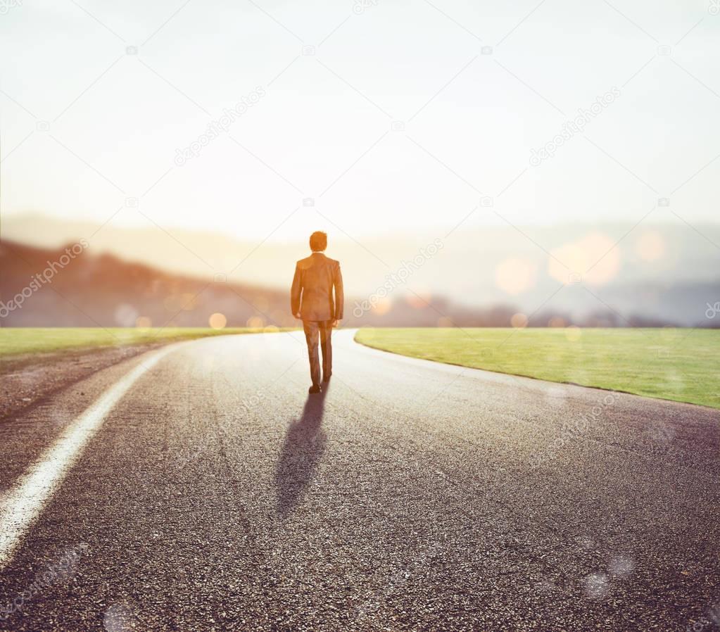 Man walks on an unknown road