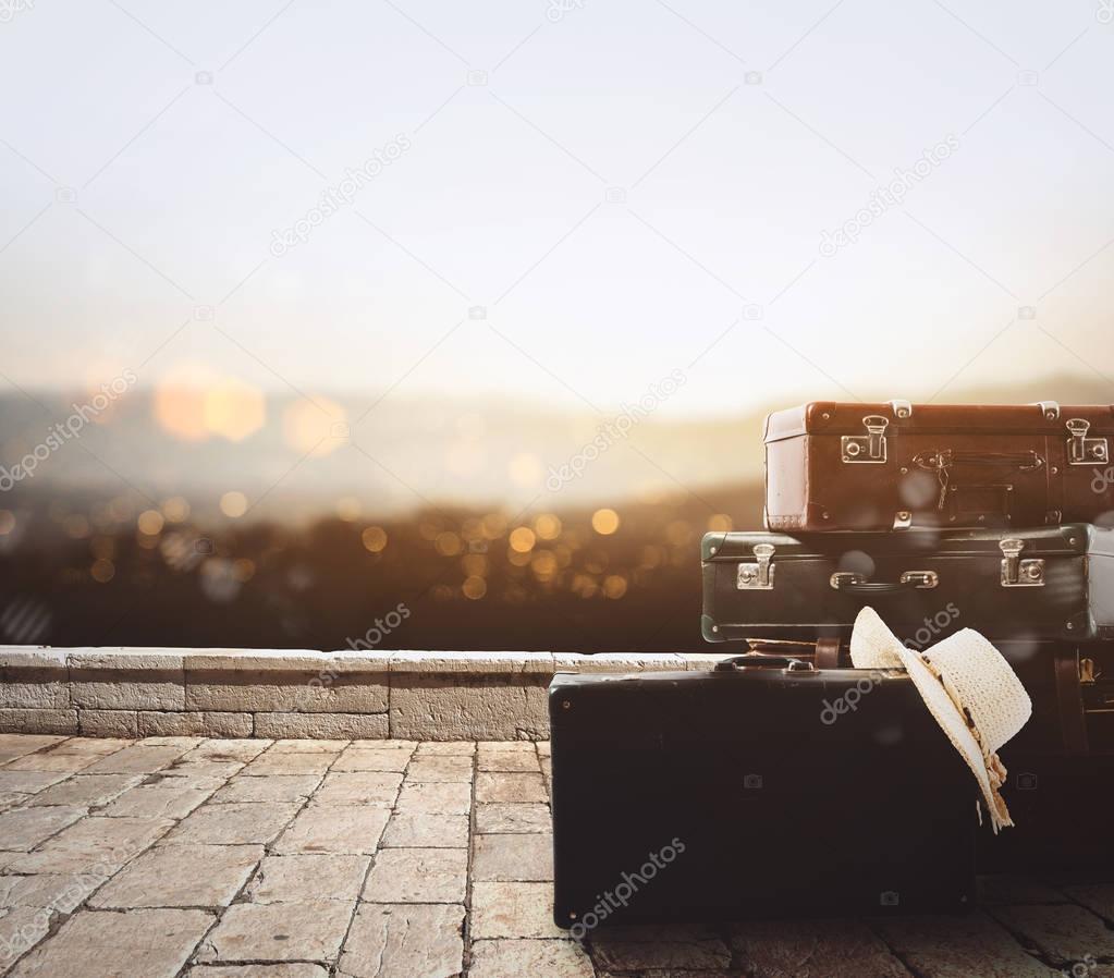 Luggage resting on a stone pavement