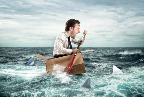 Businessman escapes  from sharks — Stock Photo, Image