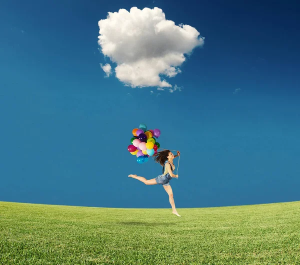 Girl jumps with colored balloons — Stock Photo, Image