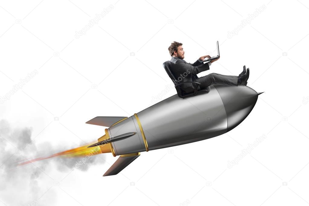Businessman on  a small rocket. 