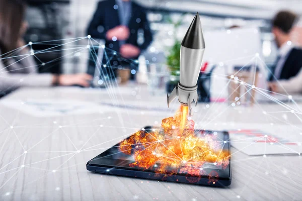 Fast rocket ready to starts from a tablet. — Stock Photo, Image