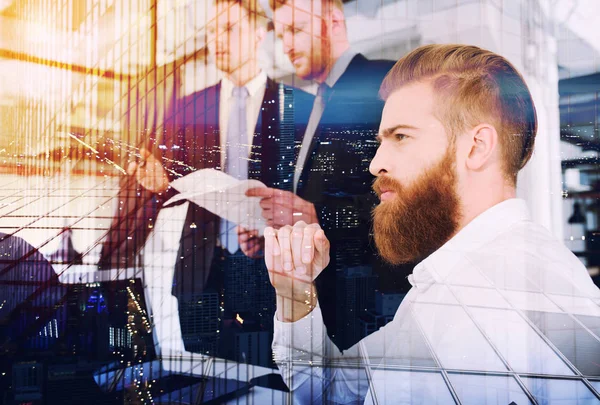 Businessmen that work together in office. Concept of teamwork and partnership. double exposure — Stock Photo, Image