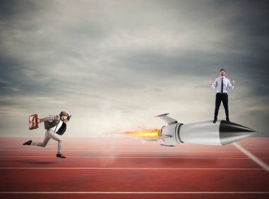 Winner businessman over a fast rocket. Concept of business competition