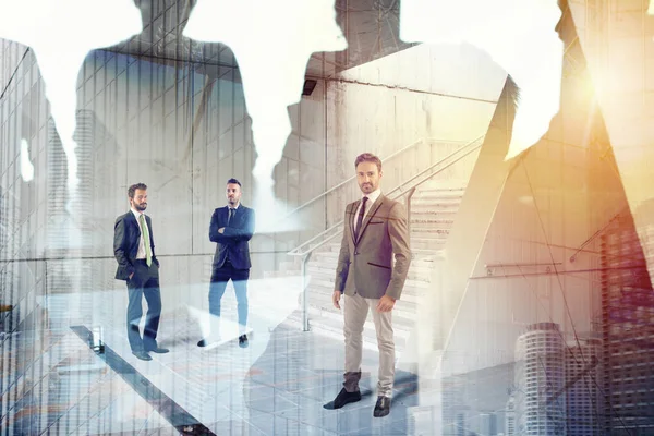 Businessmen that work together in office. Concept of teamwork and partnership — Stock Photo, Image