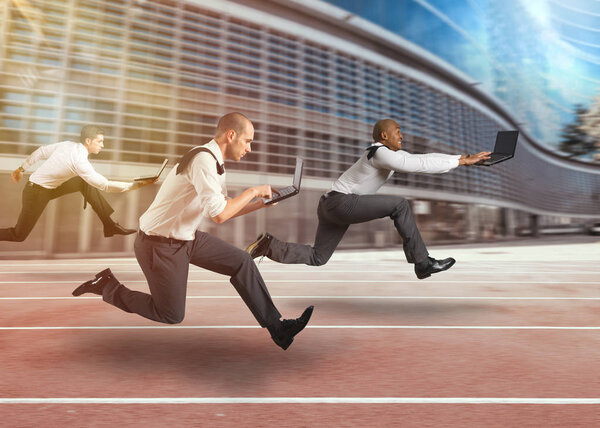 Business men working at full speed in a race track