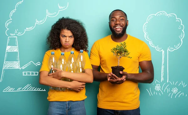 Pollution versus nature. Girl unhappy with plastic garbage and boy happy with a small tree. Save the World concept — Stock Photo, Image