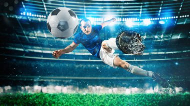 Futbolcu topa stadyumda havada akrobatik bir tekmeyle vuruyor.