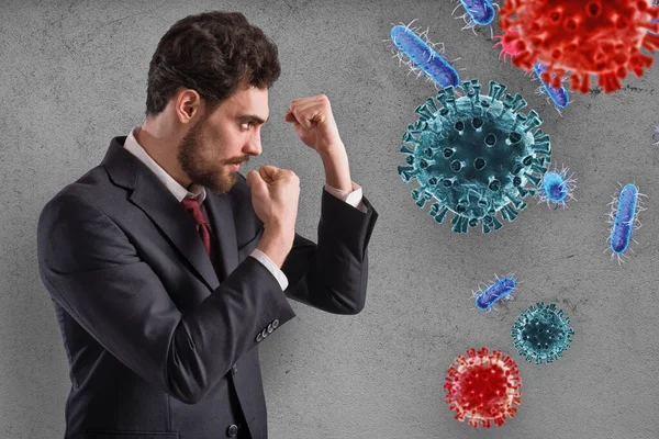Businessman fights like a boxer. Concept of viruses and bacteria attack — Stock Photo, Image