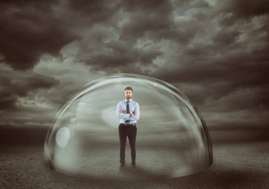 Businessman safely inside a shield dome during a storm that protects him. Protection and safety concept clipart