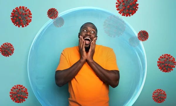 Man inside a glass sphere is secure and protected against covid19 coronaviruses. — Stock Photo, Image