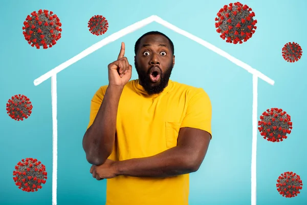 Concept of stay at home message with a man inside his house and around outside covid 19 coronavirus — Stock Photo, Image
