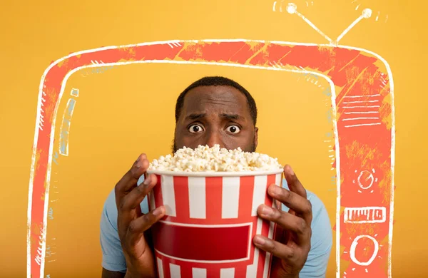 Worried boy watches a horror film. concept of entertainment and streaming tv. background — Stock Photo, Image