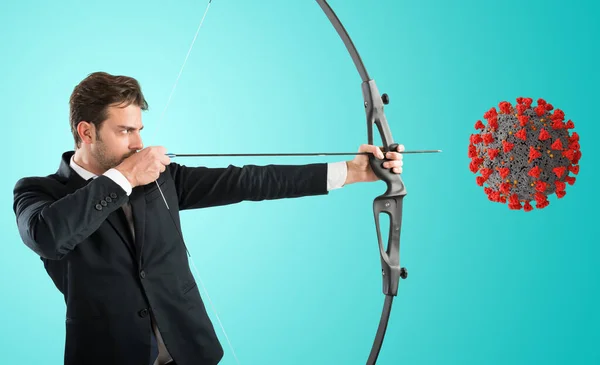 Man want to destroy the covid-19 coronavirus with bow and arrow — Stock Photo, Image