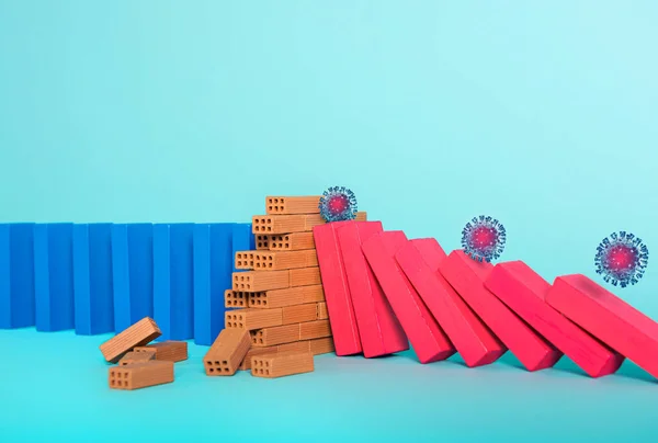 Concept of covid19 coronavirus pandemic with falling chain like a domino game. Contagion and infection progression stopped by a wall of brick. Cyan background — Stock Photo, Image