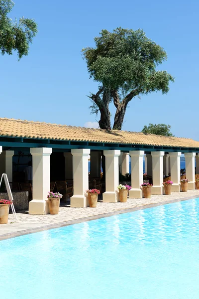 The restaurant and swimming pool in hotel, Corfu, Greece — Stock Photo, Image