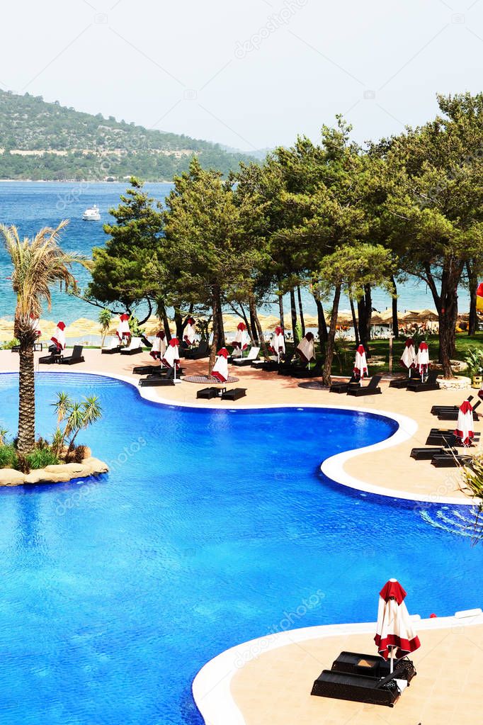 Swimming pools and beach at luxury hotel,  Bodrum, Turkey