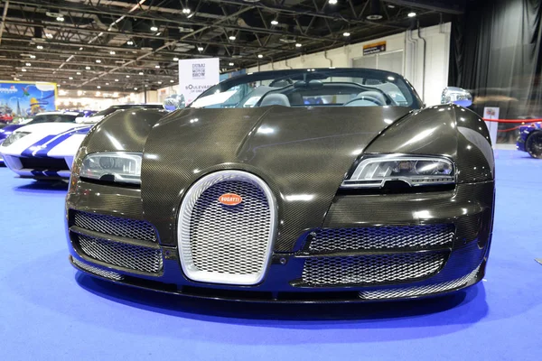 DUBAI, UAE - NOVEMBER 18: The Bugatti Veyron sportscar is on Boulevard of Dreams on Dubai Motor Show 2017 on November 18, 2017 Royalty Free Stock Images