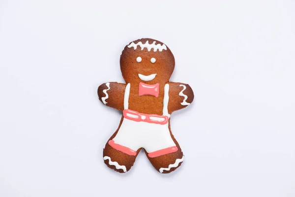 The hand-made eatable gingerbread little man on white background — Stock Photo, Image