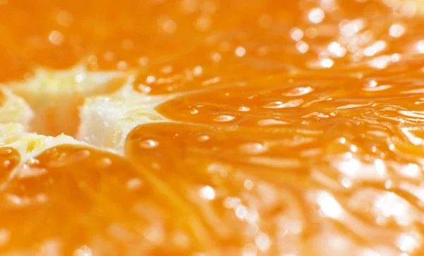 Textura na forma de uma foto macro de uma laranja . — Fotografia de Stock