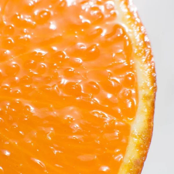 Textura na forma de uma foto macro de uma laranja . — Fotografia de Stock