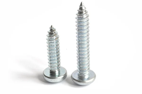 Set of screws on the white background — Stock Photo, Image