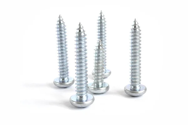 Set of screws on the white background — Stock Photo, Image