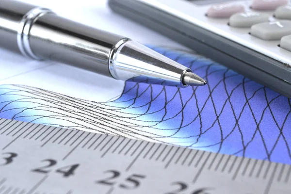 Business background with graph, ruler, pen and calculator — Stock Photo, Image