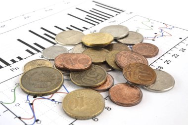Farklı sikke ve grafik ile finansal arka plan