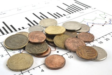 Farklı sikke ve grafik ile finansal arka plan