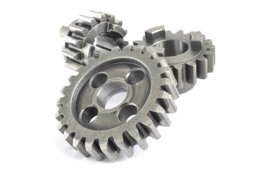 beyaz zemin üzerinde üç metal Dişliler