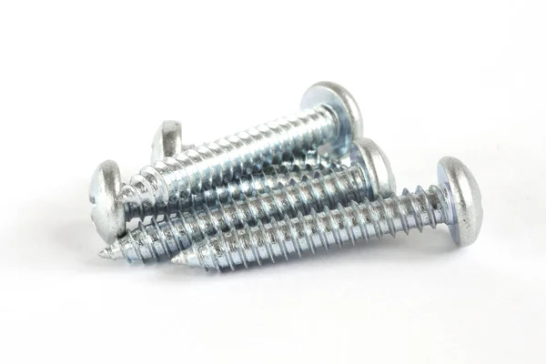 Set of screws on the white background — Stock Photo, Image