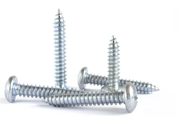 Set of screws on the white background — Stock Photo, Image