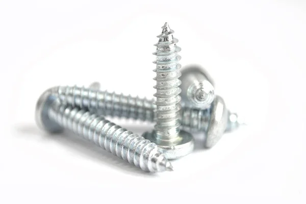 Set of screws on the white background — Stock Photo, Image