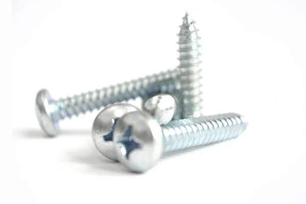 Set of screws on the white background — Stock Photo, Image