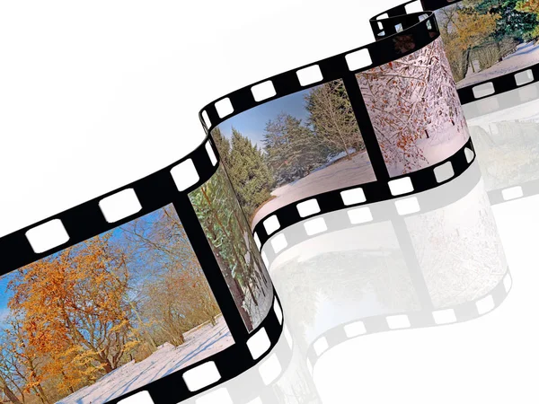 Rouleau de film avec des images en couleur (hiver) sur fond blanc — Photo