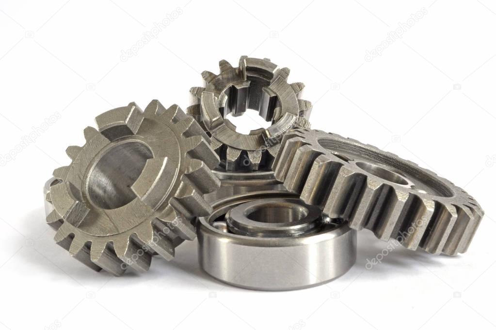 Gears and bearings on the white background