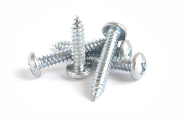 Set of screws on the white background — Stock Photo, Image