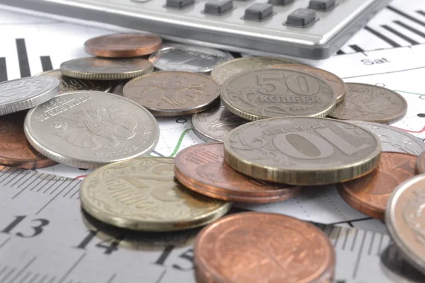 Para, hesap makinesi ve grafik ile finansal arka plan