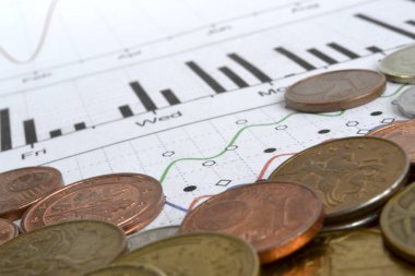 Farklı sikke ve grafik ile finansal arka plan
