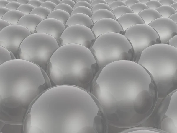 Esferas grises sobre fondo reflectante blanco — Foto de Stock