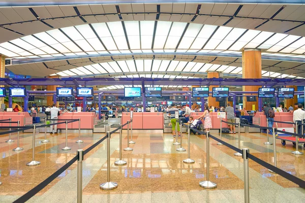 Zameldowanie liczniki lotniska Singapur-Changi — Zdjęcie stockowe