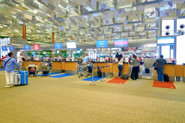 Balcões de check-in em Changi Aiport — Fotografia de Stock