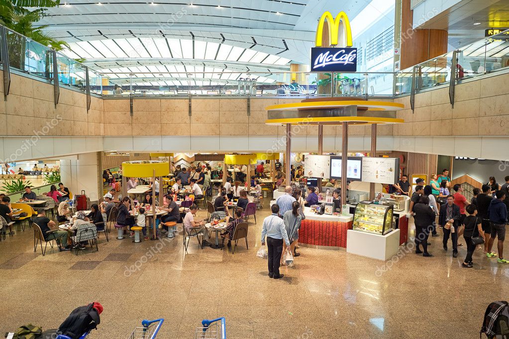 SINGAPORE - CIRCA NOVEMBER, 2015: McCafe in Singapore Changi Airport. Changi Airport  is the primary civilian airport for Singapore and one of the largest transportation hubs in Southeast Asia.