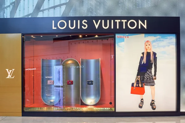 KUALA LUMPUR, MALAYSIA - APRIL 23, 2014: Louis Vuitton Shop Window In Suria  KLCC Shopping Mall. Louis Vuitton Or Shortened To LV, Is A French Fashion  House Founded In 1854 By Louis