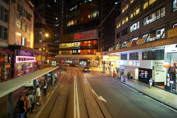 HONG KONG - OCTOBER 25, 2015: view from upper deck of double-decker tramway. The tram is the cheapest mode of public transport on Hong Kong island.